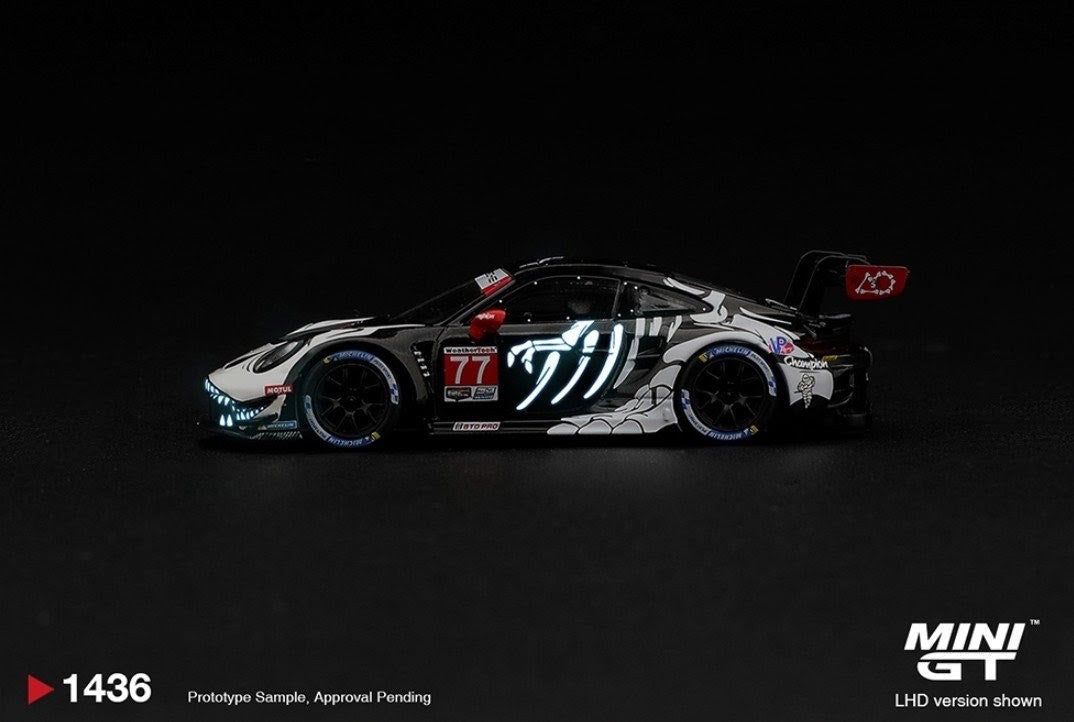 PREORDER: Mini GT x AO Racing Porsche 911 GT3 R (992) #77 "Skeleton Rexy / Skelly" - 2026 IMSA Petit Le Mans - Glow-in-the-Dark