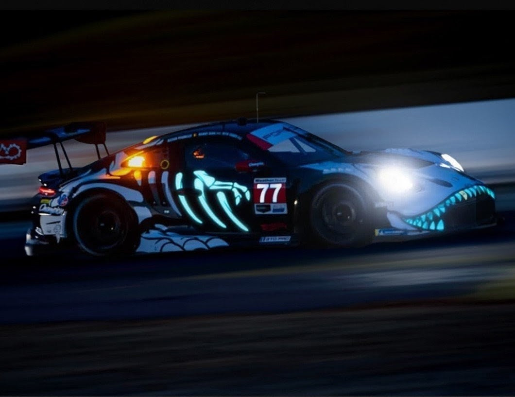 PREORDER: Mini GT x AO Racing Porsche 911 GT3 R (992) #77 "Skeleton Rexy / Skelly" - 2026 IMSA Petit Le Mans - Glow-in-the-Dark
