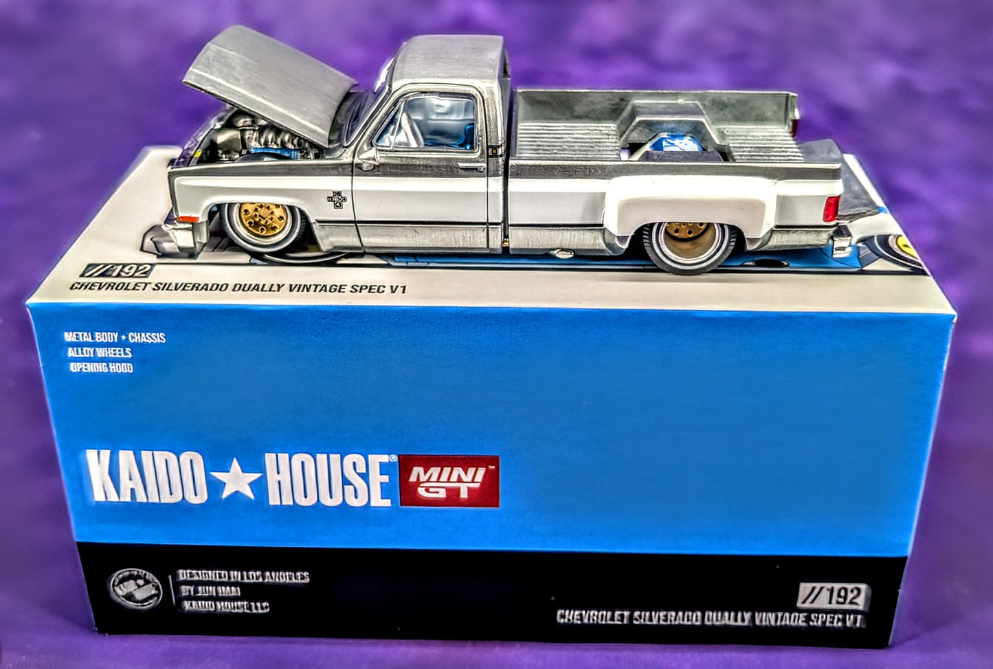 CHASE! Kaido House x Mini GT 1:64 Chevrolet Silverado Dually Vintage Spec V1 - Blue and White (RAW Metal)