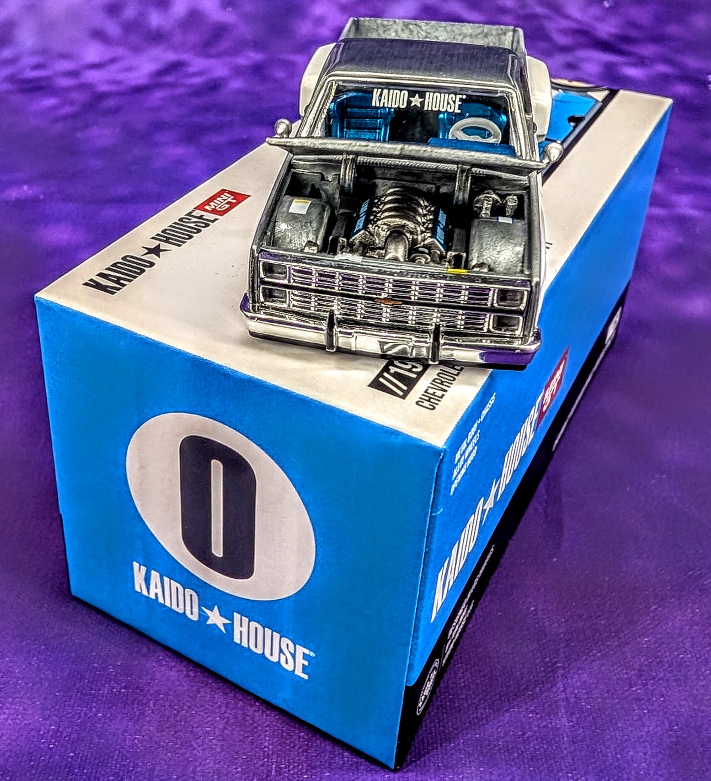 CHASE! Kaido House x Mini GT 1:64 Chevrolet Silverado Dually Vintage Spec V1 - Blue and White (RAW Metal)