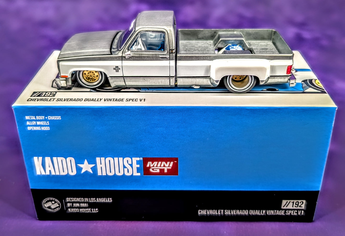 CHASE! Kaido House x Mini GT 1:64 Chevrolet Silverado Dually Vintage Spec V1 - Blue and White (RAW Metal)