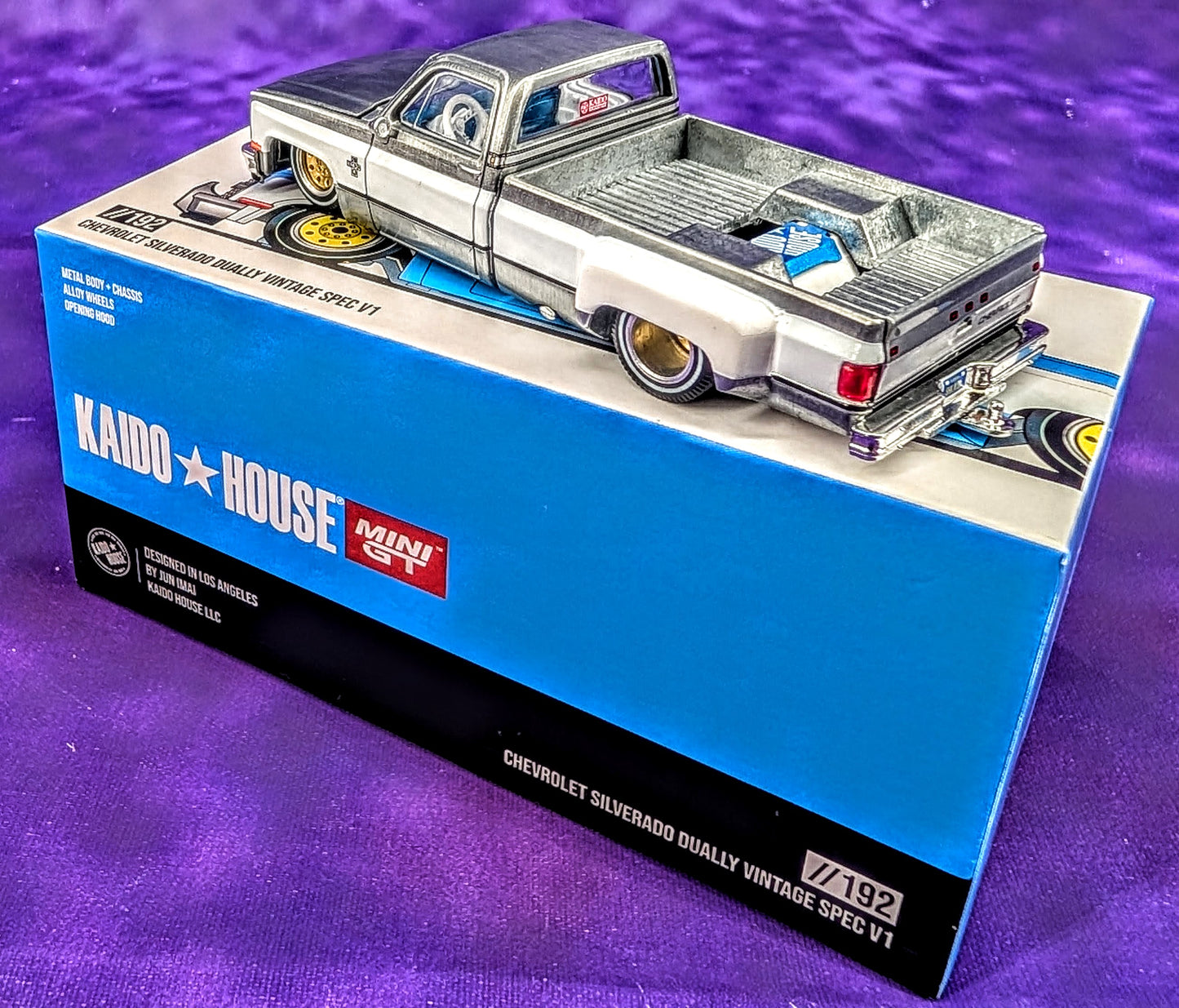 CHASE! Kaido House x Mini GT 1:64 Chevrolet Silverado Dually Vintage Spec V1 - Blue and White (RAW Metal)
